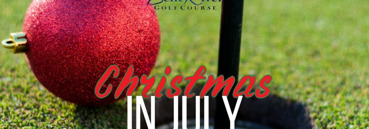 Christmas ornament on golf course green.