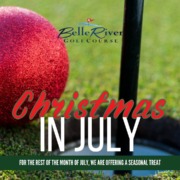 Christmas ornament on golf course green.